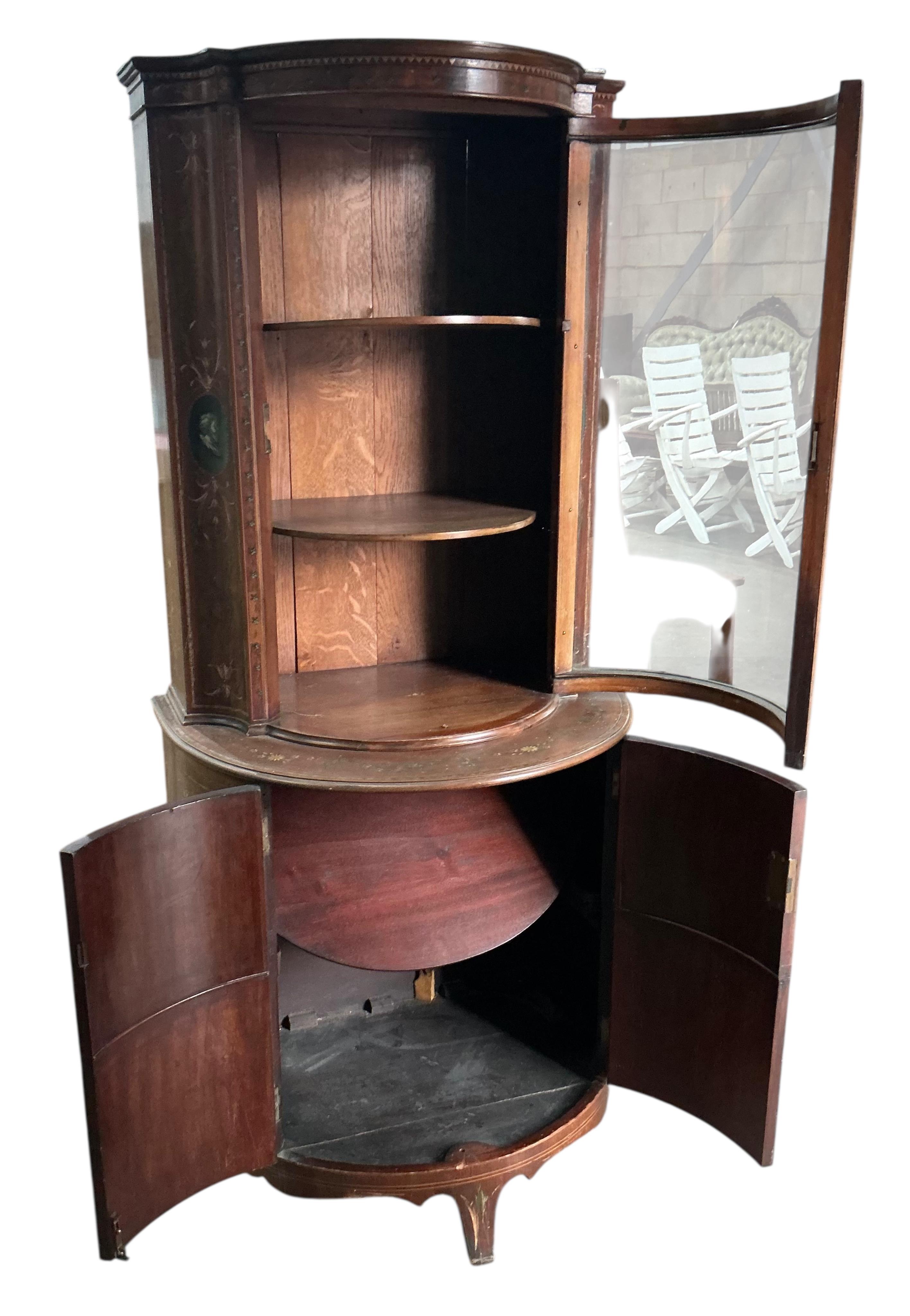 An Edwardian Sheraton Revival painted mahogany bow front display cabinet, width 70cm, depth 48cm, height 158cm